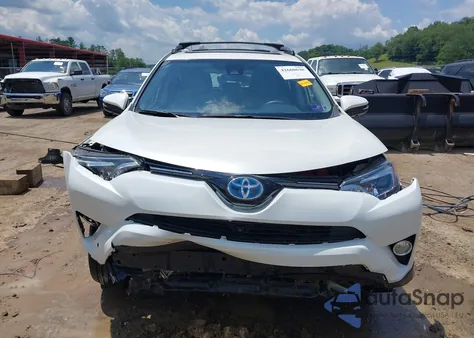 2018 Toyota Rav4 Hybrid Limited z USA, uszkodzony, nr VIN JTMDJREV1JD182079